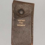 Leather change purse with the words "votes for women" on the front. 